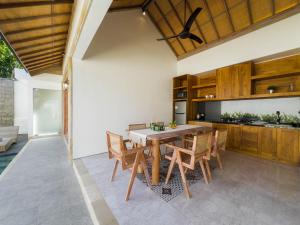 Kuchyň nebo kuchyňský kout v ubytování Villa Waturenggong Ubud