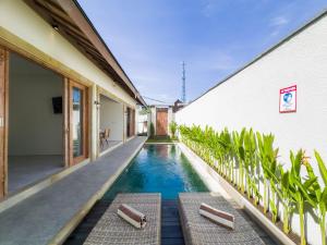Bazén v ubytování Villa Waturenggong Ubud nebo v jeho okolí + 52 fotografií