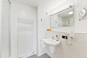 Un baño de Steiners Hotel Airport-Messe