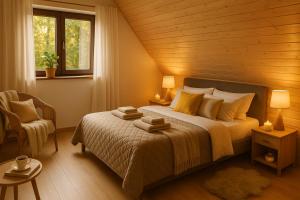 Postel nebo postele na pokoji v ubytování Domki Dream Home z tarasem i ogrodem, szybkim Wi-Fi 600Mb i VOD, Parking free EV