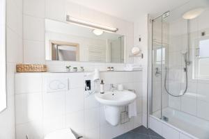 Un baño de Steiners Hotel Airport-Messe