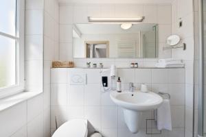 Un baño de Steiners Hotel Airport-Messe