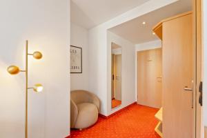 Un lugar para sentarse en Steiners Hotel Airport-Messe