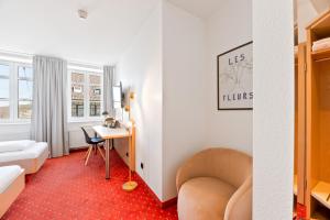 Un lugar para sentarse en Steiners Hotel Airport-Messe