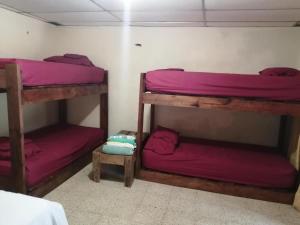 Postel nebo postele na pokoji v ubytování Waterfall Hostel