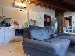 Kuchyň nebo kuchyňský kout v ubytování LOFT GARDASEE