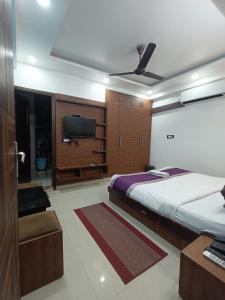 Postel nebo postele na pokoji v ubytování Hotel Bharat Stay A Family Hotel - Delhi Airport
