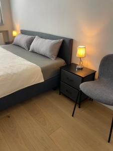 Кровать или кровати в номере Ausblick residence