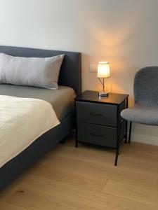 Кровать или кровати в номере Ausblick residence