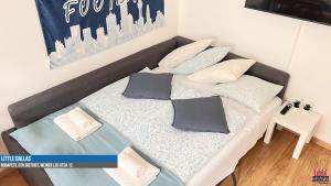 Postel nebo postele na pokoji v ubytování Little Americas Westend Apartments