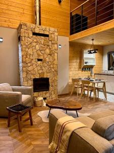 Posezení v ubytování Mount Log Cabin