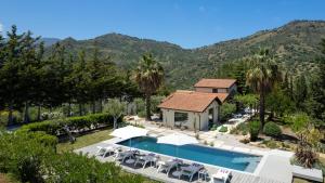 an aerial view of a house with a swimming pool at Villa Charme 6 by Massimo Villas in SantʼAmbrogio
