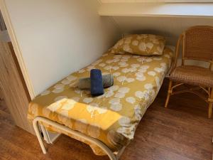 Ένα ή περισσότερα κρεβάτια σε δωμάτιο στο Vakantiewoning Zon, Zee & Duin - Egmond aan Zee