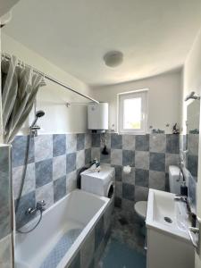 Vannituba majutusasutuses NOVOSEL apartman