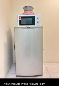 Η κουζίνα ή μικρή κουζίνα στο Kuching Riverine resort