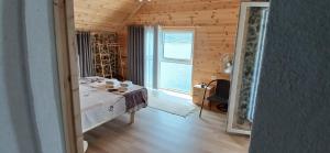 Postel nebo postele na pokoji v ubytování Nesti Relax Home