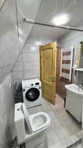 Koupelna v ubytování ხის კოტეჯი
