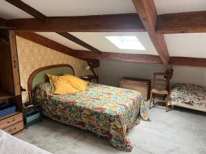 Ένα ή περισσότερα κρεβάτια σε δωμάτιο στο Le Moulin de Bel Air +34 φωτογραφίες