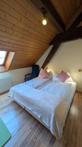 Postelja oz. postelje v sobi nastanitve Hotel Harder Minerva