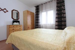 Posteľ alebo postele v izbe v ubytovaní Apartments Belsa + 31 fotografií