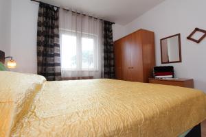 Posteľ alebo postele v izbe v ubytovaní Apartments Belsa