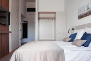 Postel nebo postele na pokoji v ubytování Hotel Stari Dvor