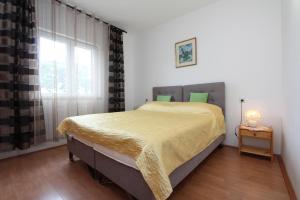 Posteľ alebo postele v izbe v ubytovaní Apartments Belsa