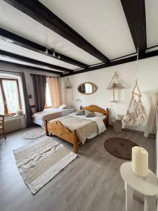 Postel nebo postele na pokoji v ubytování Hotel Wistub Le PasSage