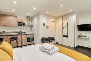 Köök või kööginurk majutusasutuses Studio Le Marais by Studio prestige