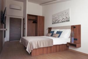 Postel nebo postele na pokoji v ubytování Hotel Stari Dvor