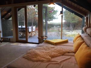 Posezení v ubytování Cottage On Anholt Facing A Large Natural Area