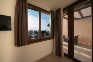 Foto dalla galleria di Appartamento Vista Lago con Terrazza a Lazise