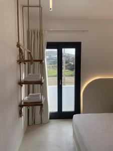 A bed or beds in a room at Faros Residences