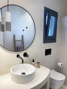 A bathroom at Faros Residences