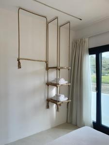 A bed or beds in a room at Faros Residences