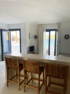 A television and/or entertainment centre at Faros Residences