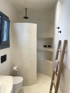 A bathroom at Faros Residences