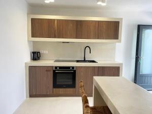 A kitchen or kitchenette at Faros Residences