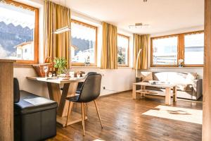 Posedenie v ubytovaní Appartements Schwarzer Adler