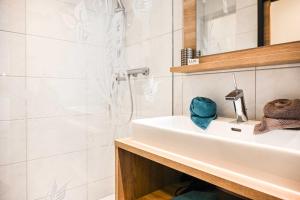 Kúpeľňa v ubytovaní Appartements Schwarzer Adler