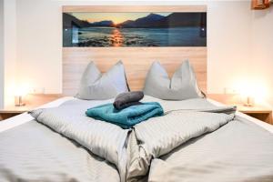 Posteľ alebo postele v izbe v ubytovaní Appartements Schwarzer Adler