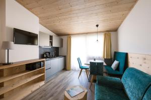 Kuchyň nebo kuchyňský kout v ubytování Hotel & Residence Rebhof