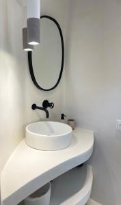 A bathroom at Faros Residences