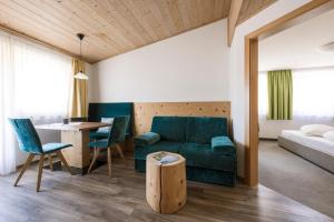 Postel nebo postele na pokoji v ubytování Hotel & Residence Rebhof