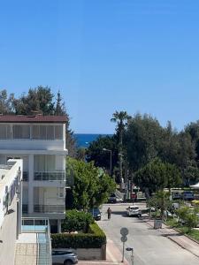 a view of a street with a building at KOLİBRY Sv HOTEL in Antalya