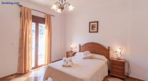 A bed or beds in a room at Villa Antonia