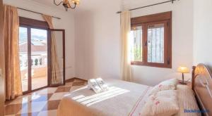 A bed or beds in a room at Villa Antonia