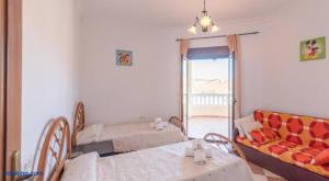 A bed or beds in a room at Villa Antonia