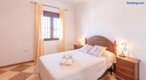 A bed or beds in a room at Villa Antonia
