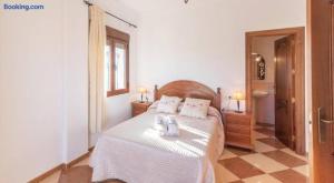 A bed or beds in a room at Villa Antonia